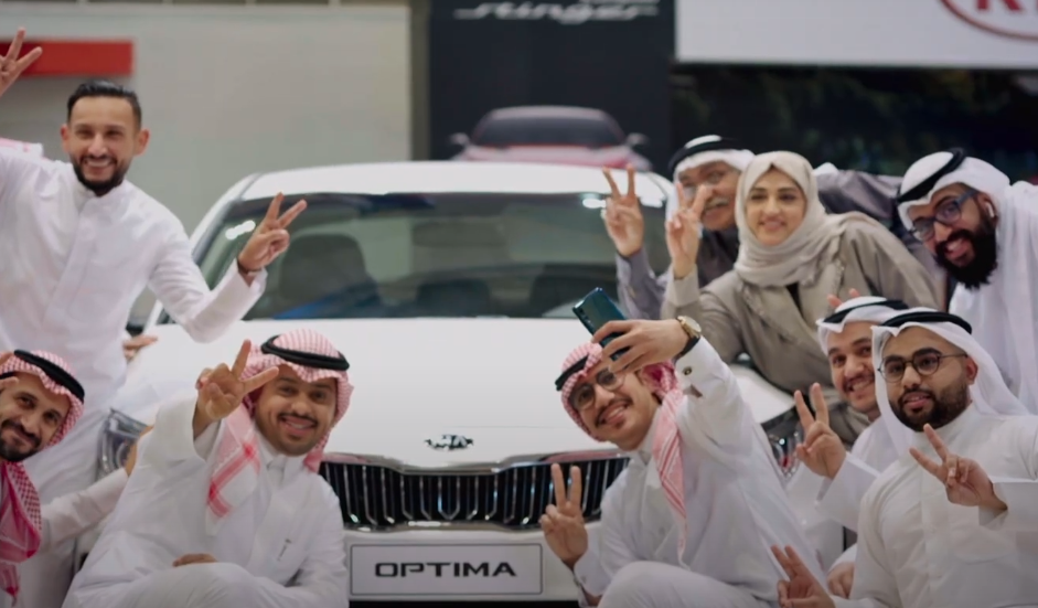 Kia Motors campaign — SUV on a desert highway at golden hour